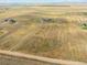 Aerial view of property showing expansive land and a house at 54333 E County Road 26, Strasburg, CO 80136