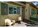 Private deck with seating area and decorative accents at 5021 Ballarat Ln, Castle Rock, CO 80108