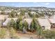 Property situated in a neighborhood with mature trees and landscape at 5021 Ballarat Ln, Castle Rock, CO 80108