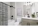 Guest bathroom with a tub, shower, and modern vanity at 1736 W 166Th Ave, Broomfield, CO 80023