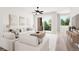 Spacious living room with patio access and an open floor plan at 1736 W 166Th Ave, Broomfield, CO 80023
