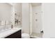 Modern bathroom with a walk-in shower and white subway tile at 1736 W 166Th Ave, Broomfield, CO 80023