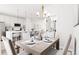 Elegant dining room with a table and chairs near kitchen at 1736 W 166Th Ave, Broomfield, CO 80023