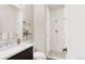 Modern bathroom with a walk-in shower and white subway tile at 1736 W 166Th Ave, Broomfield, CO 80023