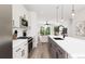 Modern kitchen with stainless steel appliances and an island at 1736 W 166Th Ave, Broomfield, CO 80023