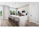 Modern kitchen with an island and breakfast bar, plenty of cabinet space at 1736 W 166Th Ave, Broomfield, CO 80023