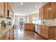 Spacious kitchen featuring granite countertops and stainless steel appliances at 7323 S Kellerman Way, Aurora, CO 80016