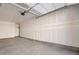 Unfinished garage with open space for storage at 6153 N Ceylon St # 303, Denver, CO 80249