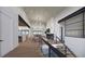 Bright and spacious living area with modern staircase and fireplace at 5061 Moss Pl, Golden, CO 80403