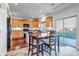 Bright kitchen with ample cabinetry, granite countertops, and stainless steel appliances at 4572 Walden Way, Denver, CO 80249