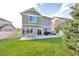 Large backyard with patio, grill and green lawn at 4572 Walden Way, Denver, CO 80249