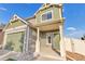 Two-story house with green accents and landscaping at 4572 Walden Way, Denver, CO 80249