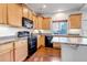 Kitchen boasts modern appliances, granite countertops, and lots of cabinet space at 4572 Walden Way, Denver, CO 80249