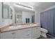 Shared bathroom with double sinks and shower/tub at 12939 Norway Maple St, Parker, CO 80134