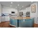 Kitchen island with granite countertops and a breakfast bar at 12939 Norway Maple St, Parker, CO 80134