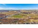 Aerial view of open space, walking trails, and a creek at 12939 Norway Maple St, Parker, CO 80134