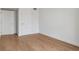 Spacious bedroom with hardwood floors and ample closet space at 3575 Chestnut Pl # 403, Denver, CO 80216
