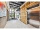 Stylish building lobby with elevator and wood wall accents at 3575 Chestnut Pl # 403, Denver, CO 80216