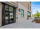 Modern building exterior with glass and brick accents at 3575 Chestnut Pl # 403, Denver, CO 80216