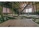Unfinshed attic space with exposed beams and insulation at 1538 Oneida St, Denver, CO 80220