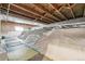 Unfinished basement with crawlspace and some flooring at 1538 Oneida St, Denver, CO 80220