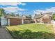 Large backyard with detached garage and patio at 1538 Oneida St, Denver, CO 80220