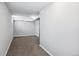 Finished basement room with neutral carpeting and plenty of light at 1538 Oneida St, Denver, CO 80220
