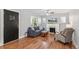 Living room with hardwood floors and fireplace at 1538 Oneida St, Denver, CO 80220