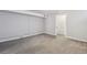 Spacious finished basement with neutral carpeting at 1538 Oneida St, Denver, CO 80220