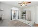 Main bedroom with hardwood floors and en-suite bathroom at 1538 Oneida St, Denver, CO 80220