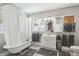 Bright bathroom featuring a clawfoot tub and shower at 1538 Oneida St, Denver, CO 80220