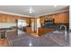 Eat-in kitchen with stainless steel appliances and granite counters at 102 Staghorn Way, Franktown, CO 80116