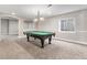 Finished basement recreation area with pool table at 102 Staghorn Way, Franktown, CO 80116