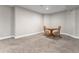 Finished basement room with small table and chairs at 102 Staghorn Way, Franktown, CO 80116