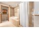 Bathroom with bathtub, shower, and tile flooring at 102 Staghorn Way, Franktown, CO 80116