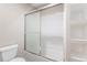 Bathroom with shower/tub combo and built-in shelving at 102 Staghorn Way, Franktown, CO 80116
