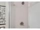 Clean shower with white subway tile and modern fixtures at 2020 Arapahoe St # 950, Denver, CO 80205