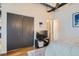 Spacious bedroom closet with dark gray sliding doors at 2020 Arapahoe St # 950, Denver, CO 80205