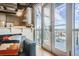 Modern living room with access to a balcony and city views at 2020 Arapahoe St # 950, Denver, CO 80205
