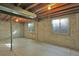 Unfinished basement with two windows at 8479 Sandreed Cir, Parker, CO 80134