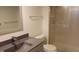 Basement bathroom with shower and updated vanity at 1485 S Salem Way, Aurora, CO 80012