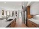 Modern kitchen with an island and stainless steel appliances at 1811 N Williams St, Denver, CO 80218