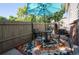 Private patio with table and chairs, perfect for outdoor dining at 4673 S Lowell Blvd, Denver, CO 80236