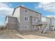 Two-story home with deck and backyard at 3322 N Highlands Creek Pkwy, Aurora, CO 80019
