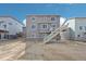 Two-story home with deck and backyard at 3322 N Highlands Creek Pkwy, Aurora, CO 80019