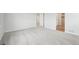 Spacious bedroom featuring carpet flooring and an ensuite bathroom at 3322 N Highlands Creek Pkwy, Aurora, CO 80019