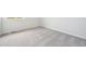 Bright bedroom featuring carpet flooring and a window at 3322 N Highlands Creek Pkwy, Aurora, CO 80019