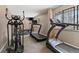 Well-equipped fitness center with treadmills and elliptical machines at 909 N Logan St # 4A, Denver, CO 80203