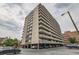 High rise building with parking and city views at 909 N Logan St # 4A, Denver, CO 80203