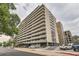 Modern high rise building with parking and city views at 909 N Logan St # 4A, Denver, CO 80203